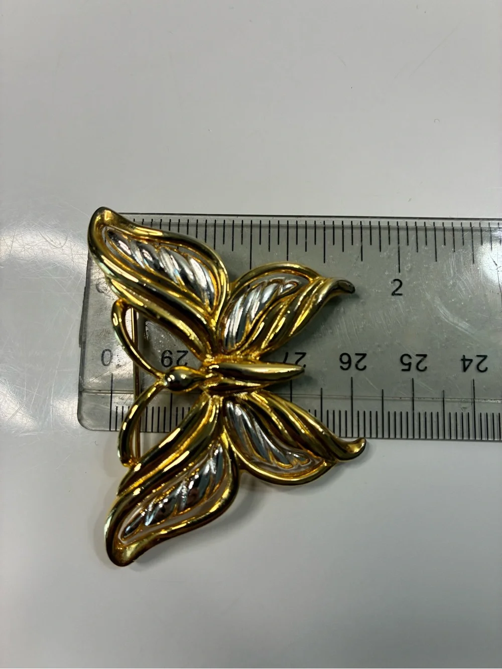 Two-Tone Gold and Silver Butterfly Brooch and Classic Infinity Floral Pin